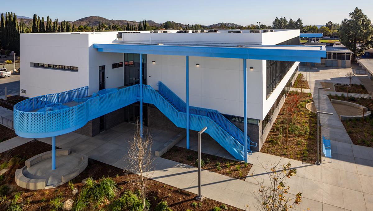 Blue staircase and guardrail by BOK Modern installed at school facility
