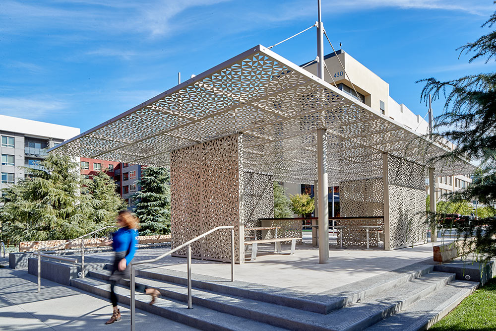 metal canopy cover by BOK Modern above outdoor seating area