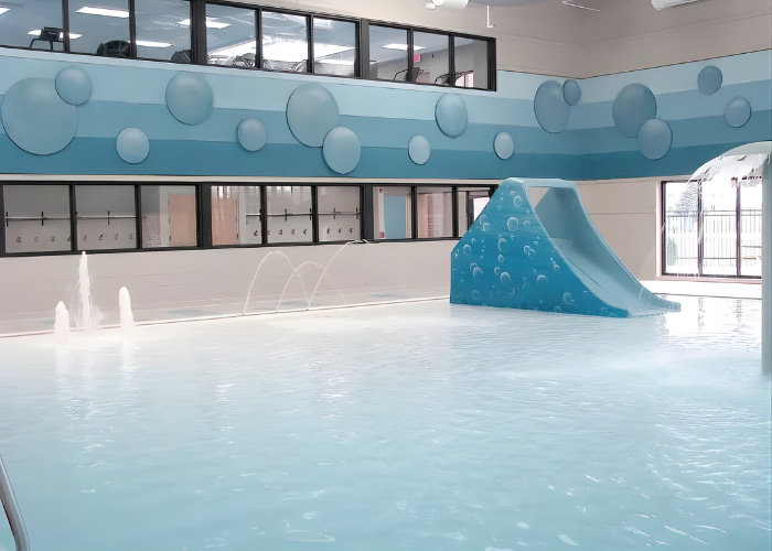 TECTUM Direct-Attach Wall Panels in indoor aquatic facility
